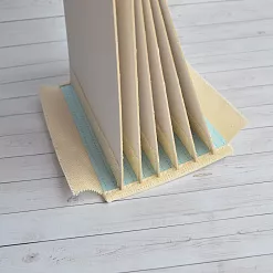 Переплет на 7 разворотов, с листами 15х15, цвет голубой, шаг 1 см Переплет на 7 разворотов, с листами 15х15, цвет голубой, шаг 1 см