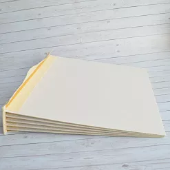 Переплет на 6 разворотов, с листами 25х25, цвет золотой, шаг 0,7 см