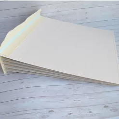 Переплет на 6 разворотов, с листами 25х25, цвет голубой, шаг 0,7 см 