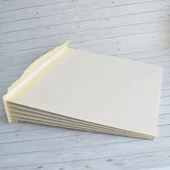 Переплет на 6 разворотов, с листами 25х25, цвет жемчуг, шаг 0,7 см Переплет на 6 разворотов, с листами 25х25, цвет жемчуг, шаг 0,7 см