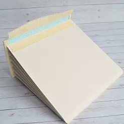 Переплет на 7 разворотов, с листами 15х15, цвет голубой, шаг 1 см Переплет на 7 разворотов, с листами 15х15, цвет голубой, шаг 1 см