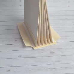 Переплет на 7 разворотов, с листами 15х15, цвет жемчуг, шаг 0,7 см Переплет на 7 разворотов, с листами 15х15, цвет жемчуг, шаг 0,7 см