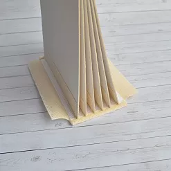 Переплет на 7 разворотов, с листами 15х15, цвет белый, шаг 0,7 см