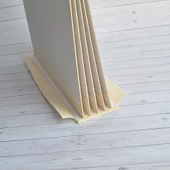 Переплет на 6 разворотов, с листами 25х25, цвет жемчуг, шаг 0,7 см Переплет на 6 разворотов, с листами 25х25, цвет жемчуг, шаг 0,7 см