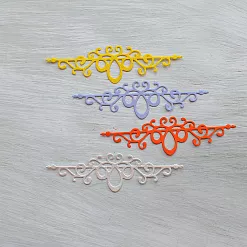 Набор вырубок "Новогодние вензеля", цвет желтый и сиреневый Набор вырубок "Новогодние вензеля", цвет желтый и сиреневый